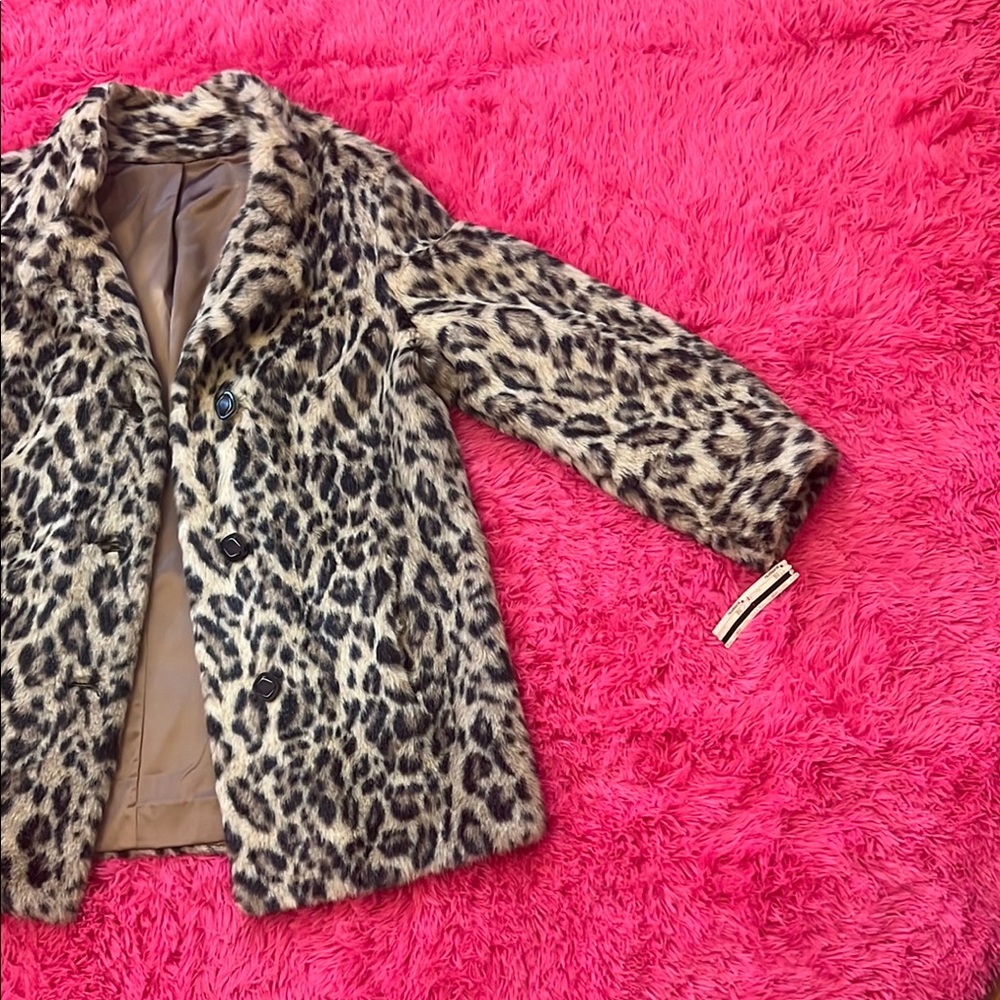 Vintage leopard print coat with original tags from Hudson’s department store